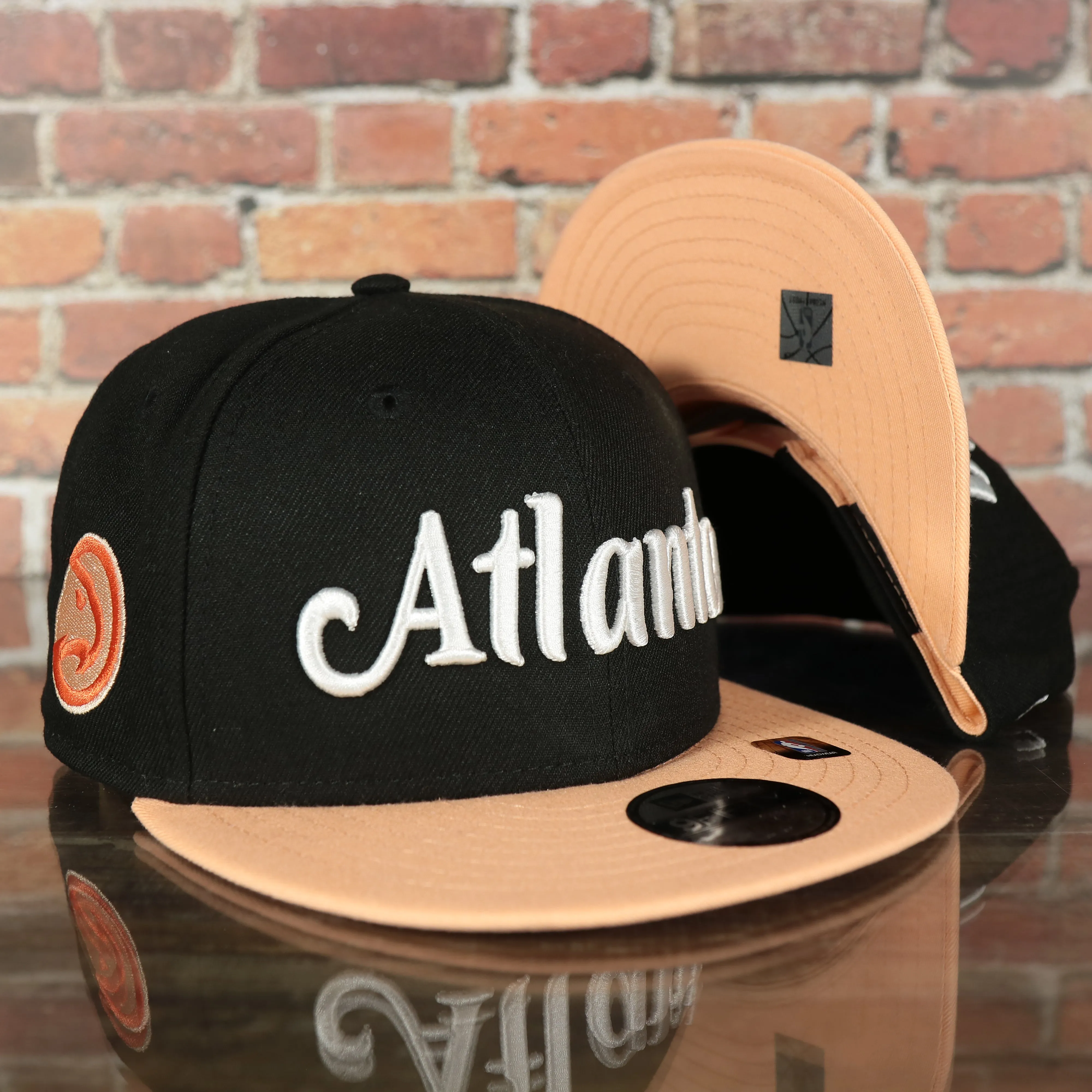 Atlanta Hawks 2022 City Edition Atlanta Peach Logo Peach Bottom Youth 9Fifty Side Patch Snapback Cap | New Era, Black