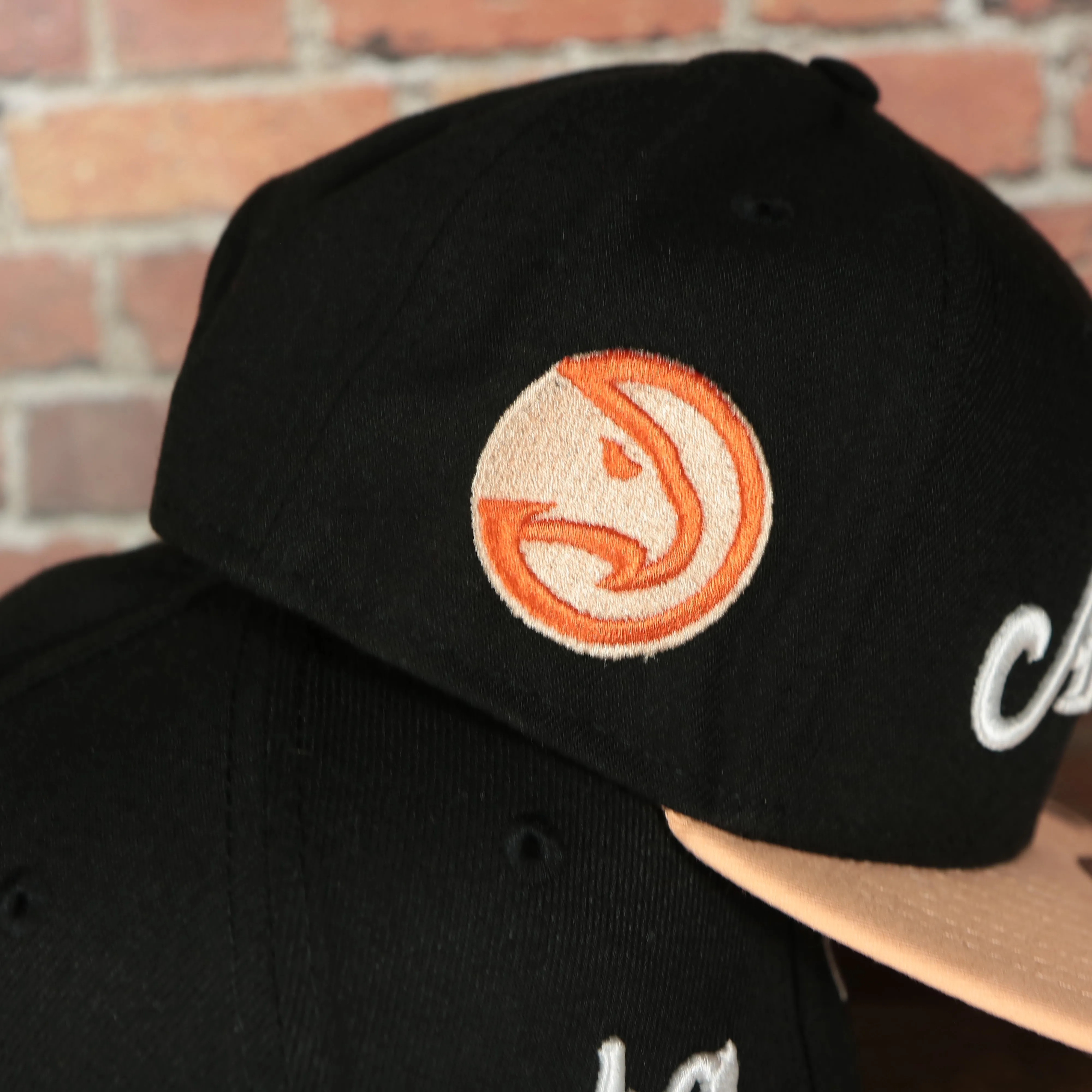 Atlanta Hawks 2022 City Edition Atlanta Peach Logo Peach Bottom Youth 9Fifty Side Patch Snapback Cap | New Era, Black