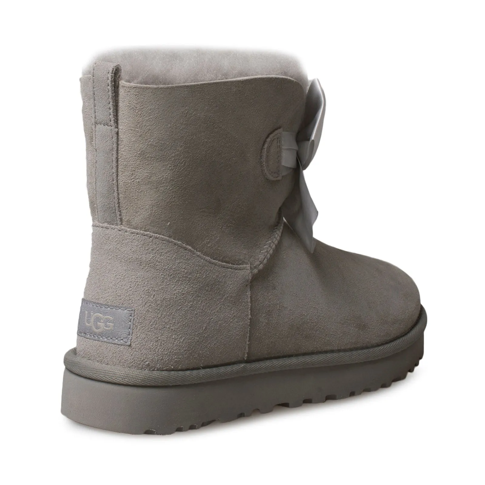 UGG Gita Bow Mini Seal Boots - Women's